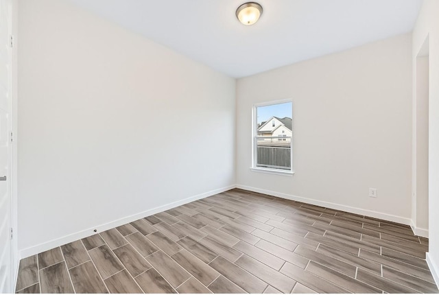 817 Craven Hill Ln, Leander, TX 78641 - unfurnished room featuring wood finish floors and baseboards