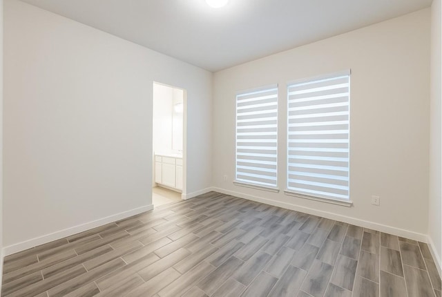 817 Craven Hill Ln, Leander, TX 78641 - empty room with wood finished floors and baseboards