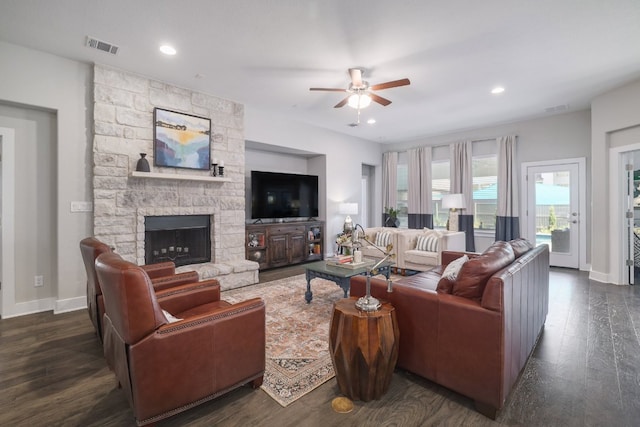 132 Lockhart Dr, Liberty Hill, TX 78642 - living room with ceiling fan, baseboards, dark wood-style floors, a fireplace, and recessed lighting