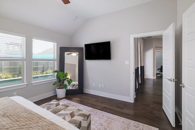 132 Lockhart Dr, Liberty Hill, TX 78642 - bedroom featuring dark wood-style floors, vaulted ceiling, baseboards, and ceiling fan