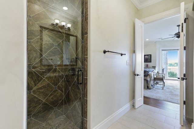 1353 Osprey Ridge Loop, Lago Vista, TX 78645 - full bath featuring a stall shower, ornamental molding, baseboards, and a ceiling fan