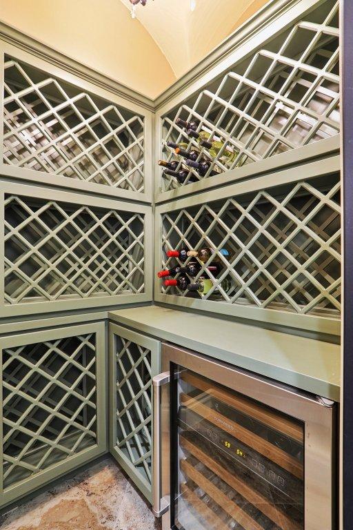 1353 Osprey Ridge Loop, Lago Vista, TX 78645 - wine area featuring beverage cooler and a bar