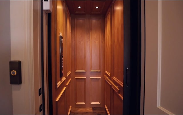1353 Osprey Ridge Loop, Lago Vista, TX 78645 - elevator featuring recessed lighting and wood finished floors