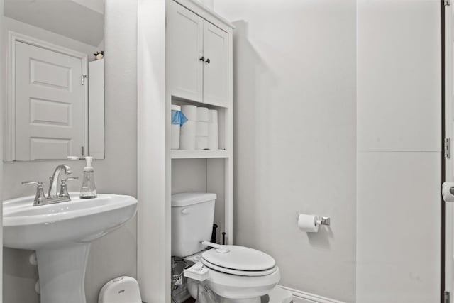 7818 Moody Bnd, Austin, TX 78744 - half bath with toilet and a sink