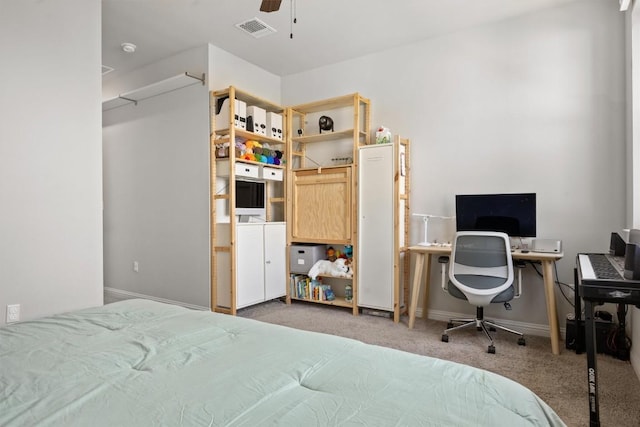 7818 Moody Bnd, Austin, TX 78744 - carpeted bedroom featuring baseboards, ceiling fan, and a desk