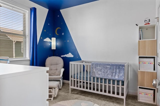 7818 Moody Bnd, Austin, TX 78744 - carpeted bedroom with a nursery area and baseboards