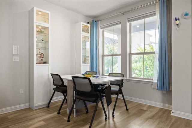 7818 Moody Bnd, Austin, TX 78744 - dining area featuring wood finished floors and baseboards