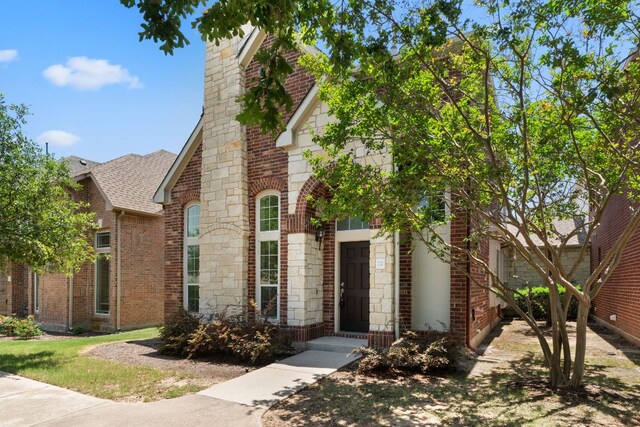 14812 Avery Ranch Blvd Unit 72, Austin, TX 78717 - view of front of property with roof with shingles, brick siding, and stone siding