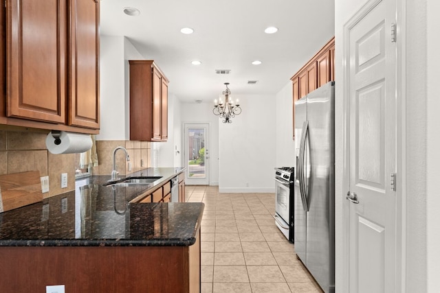 14812 Avery Ranch Blvd Unit 72, Austin, TX 78717 - kitchen featuring a sink, stainless steel appliances, backsplash, light tile patterned floors, and recessed lighting
