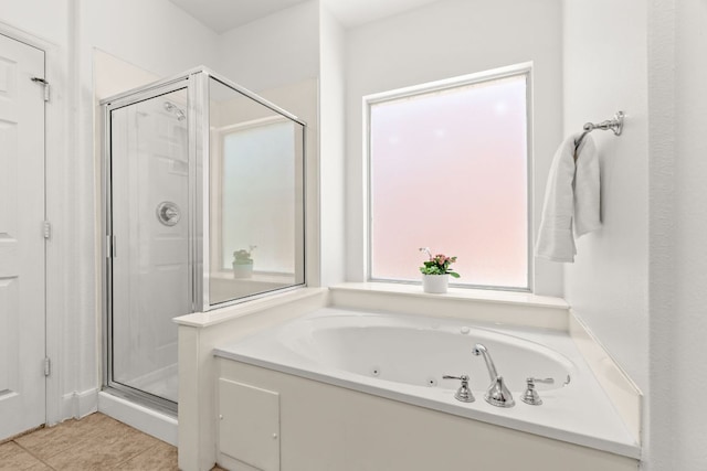 14812 Avery Ranch Blvd Unit 72, Austin, TX 78717 - full bath with a stall shower, a jetted tub, and tile patterned flooring