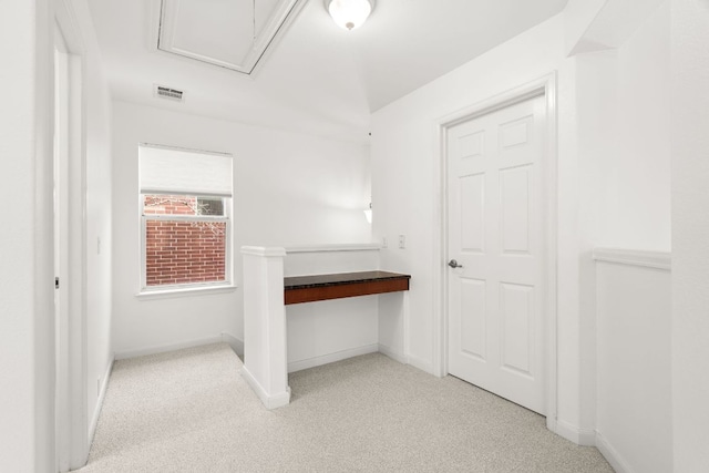 14812 Avery Ranch Blvd Unit 72, Austin, TX 78717 - hallway featuring light carpet, baseboards, and attic access