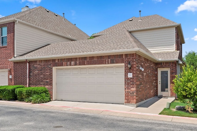 14812 Avery Ranch Blvd Unit 72, Austin, TX 78717 - view of home's exterior with brick siding, a shingled roof, and an attached garage