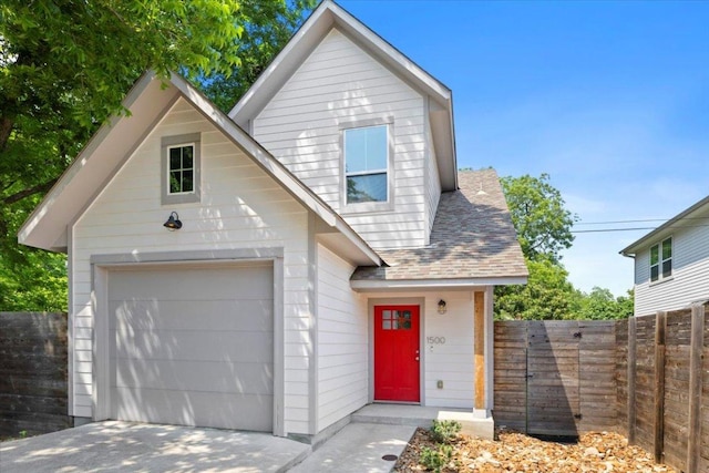 1500 Justin Ln Unit 2, Austin, TX 78757 - view of front facade with a shingled roof