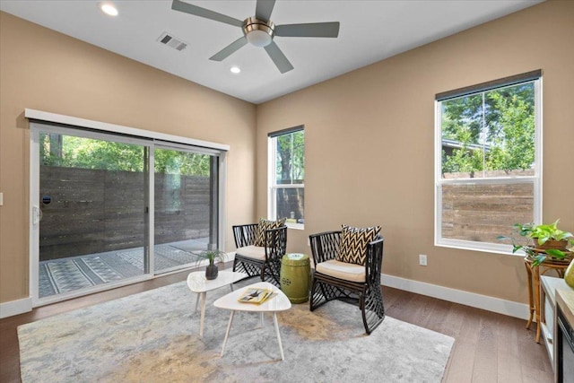 1500 Justin Ln Unit 2, Austin, TX 78757 - sitting room featuring a ceiling fan, wood finished floors, baseboards, and recessed lighting
