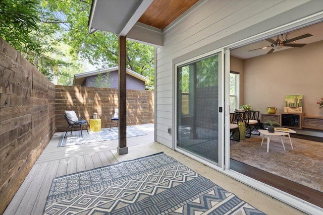 1500 Justin Ln Unit 2, Austin, TX 78757 - wooden deck featuring a fenced backyard and a ceiling fan
