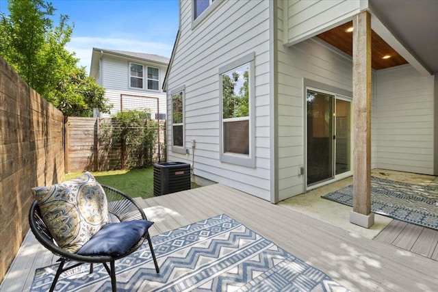 1500 Justin Ln Unit 2, Austin, TX 78757 - deck with central AC and a fenced backyard