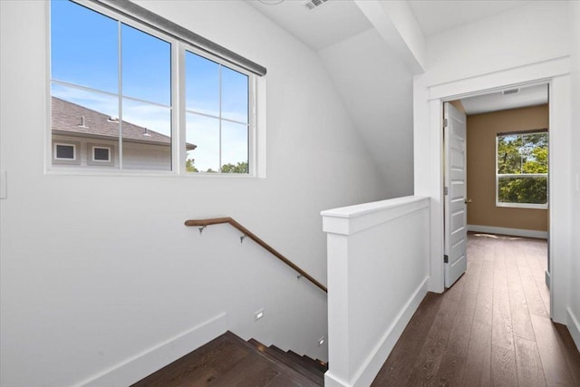 1500 Justin Ln Unit 2, Austin, TX 78757 - corridor with an upstairs landing, dark wood finished floors, and baseboards
