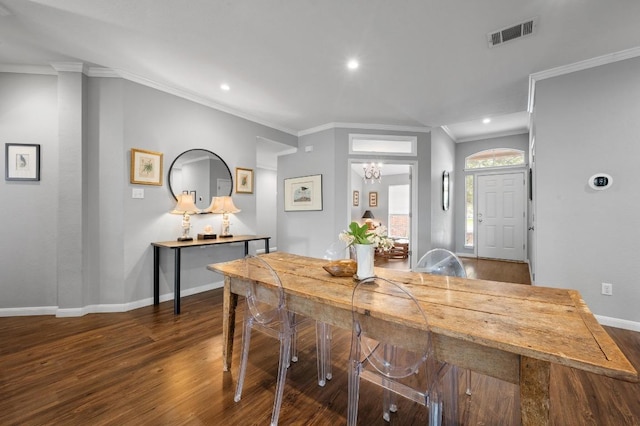 4600 Tello Path, Austin, TX 78749 - dining space featuring dark wood-type flooring, crown molding, baseboards, recessed lighting, and a chandelier
