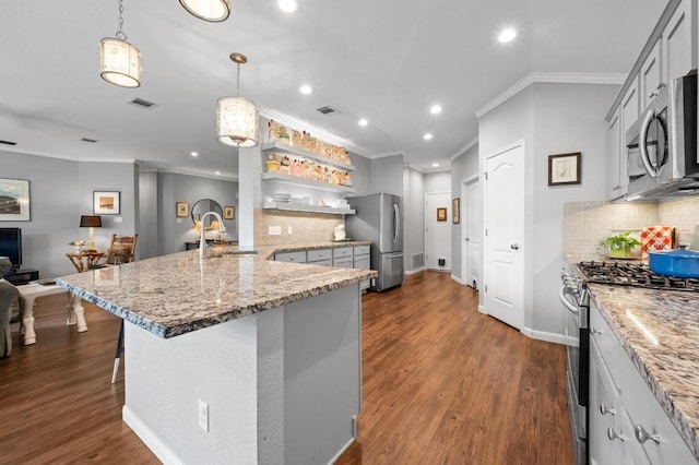 4600 Tello Path, Austin, TX 78749 - kitchen with appliances with stainless steel finishes, a sink, ornamental molding, tasteful backsplash, and light stone countertops