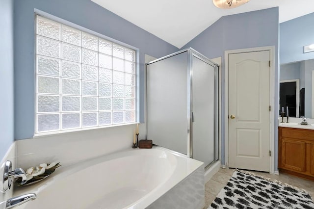 4600 Tello Path, Austin, TX 78749 - full bath with a shower stall, a garden tub, vanity, healthy amount of natural light, and lofted ceiling
