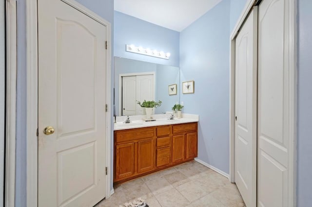 4600 Tello Path, Austin, TX 78749 - full bath with double vanity and baseboards