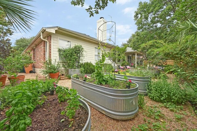 4600 Tello Path, Austin, TX 78749 - view of yard with a vegetable garden