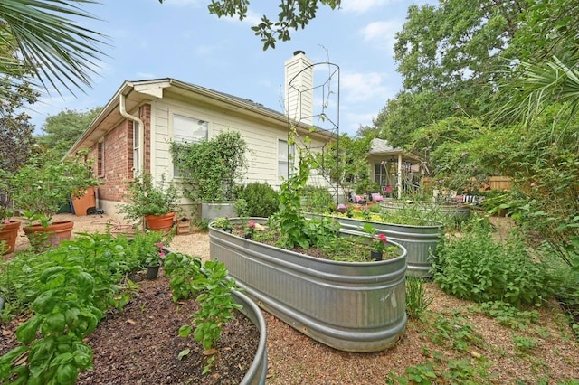 4600 Tello Path, Austin, TX 78749 - view of yard with a vegetable garden