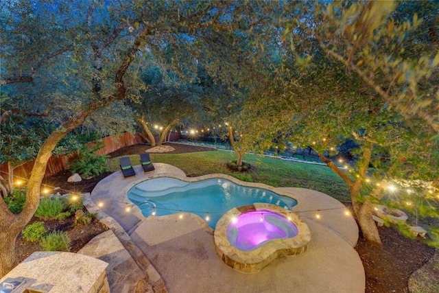 13601 Montview Dr, Austin, TX 78732 - view of swimming pool with a fenced backyard and a pool with connected hot tub