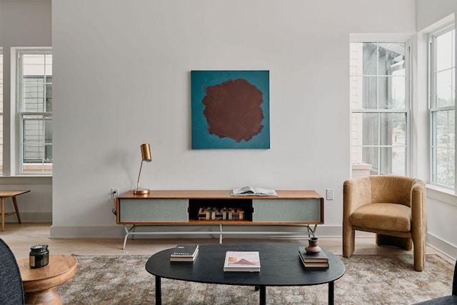 2209 Woodland Ave Unit 301, Austin, TX 78741 - living area with wood finished floors and baseboards