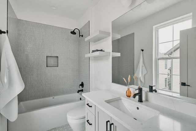 2209 Woodland Ave Unit 301, Austin, TX 78741 - bathroom featuring vanity, shower / bath combination, and toilet