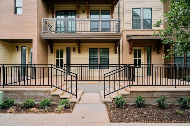 2209 Woodland Ave Unit 301, Austin, TX 78741 - view of exterior entry with a balcony