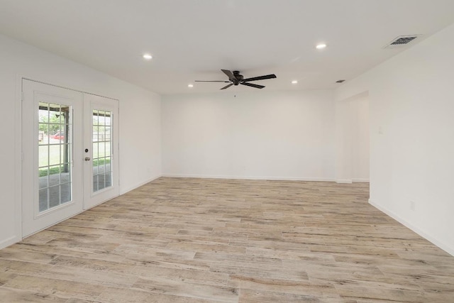 131 Roundup Dr, Liberty Hill, TX 78642 - empty room featuring french doors, recessed lighting, light wood finished floors, a ceiling fan, and baseboards