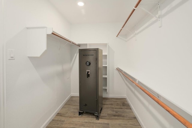 131 Roundup Dr, Liberty Hill, TX 78642 - spacious closet with wood finished floors
