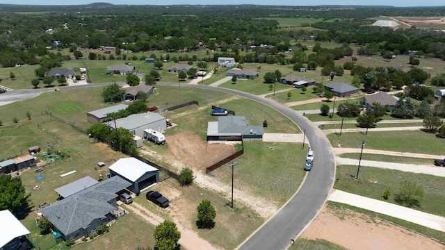 131 Roundup Dr, Liberty Hill, TX 78642 - aerial overview of property's location with nearby suburban area