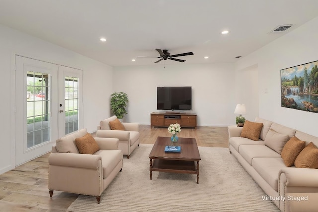 131 Roundup Dr, Liberty Hill, TX 78642 - living room featuring recessed lighting, light wood-style flooring, french doors, and ceiling fan