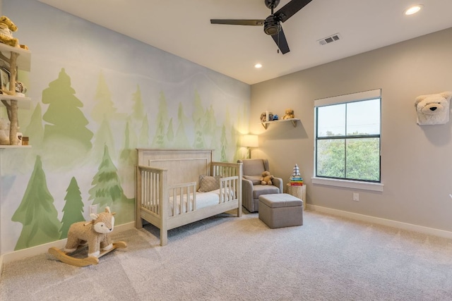 5904 Hudson Bend Rd, Austin, TX 78734 - carpeted bedroom with baseboards, a crib, recessed lighting, and a ceiling fan