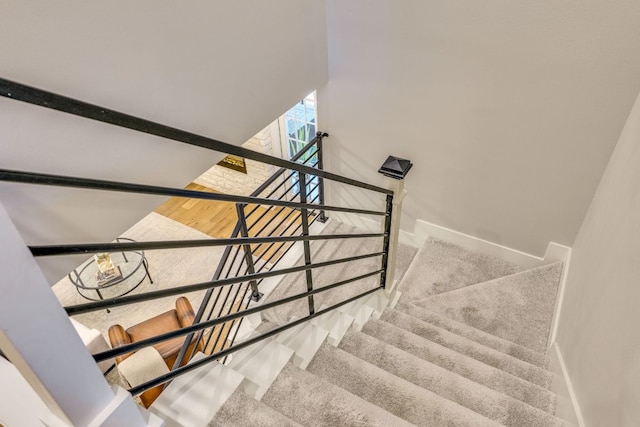 5904 Hudson Bend Rd, Austin, TX 78734 - stairway featuring baseboards and carpet