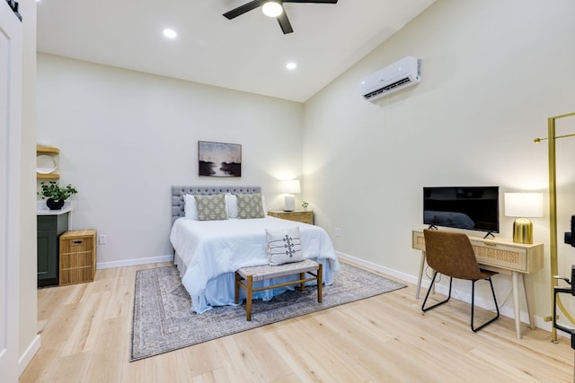 5904 Hudson Bend Rd, Austin, TX 78734 - bedroom with a wall mounted air conditioner, wood finished floors, baseboards, ceiling fan, and recessed lighting