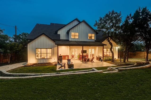 5904 Hudson Bend Rd, Austin, TX 78734 - rear view of property with board and batten siding, french doors, a patio area, and a shingled roof