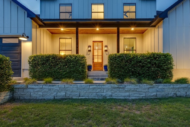 5904 Hudson Bend Rd, Austin, TX 78734 - property entrance featuring board and batten siding and a lawn