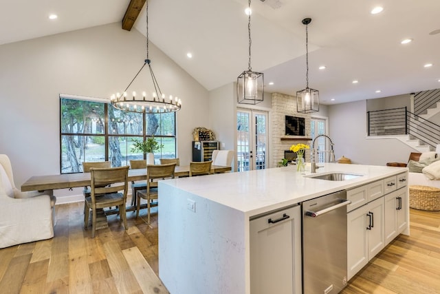 5904 Hudson Bend Rd, Austin, TX 78734 - kitchen with dishwasher, a sink, light wood-style flooring, recessed lighting, and high vaulted ceiling