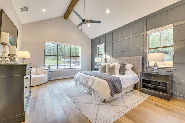 5904 Hudson Bend Rd, Austin, TX 78734 - bedroom with beamed ceiling, multiple windows, light wood-style floors, high vaulted ceiling, and a ceiling fan