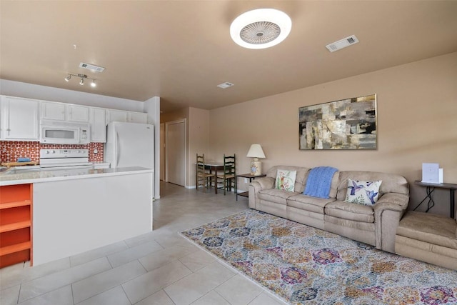 423 County Road 1010, Lampasas, TX 76550 - living room with light tile patterned floors