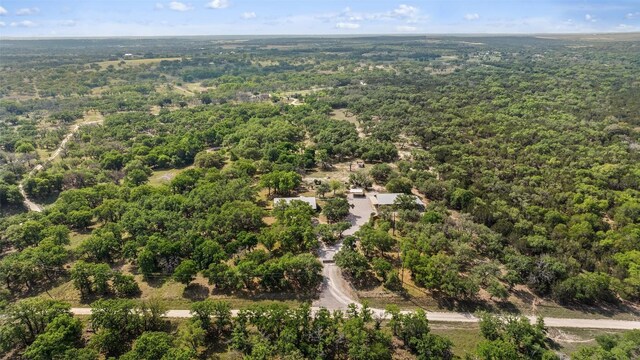 423 County Road 1010, Lampasas, TX 76550 - bird's eye view of a heavily wooded area