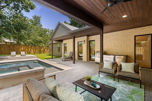 5615 Shoalwood Ave, Austin, TX 78756 - view of patio featuring area for grilling, ceiling fan, an outdoor living space, and an in-ground hot tub