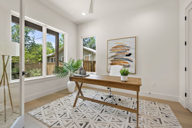 5615 Shoalwood Ave, Austin, TX 78756 - home office featuring light wood-style flooring, baseboards, and recessed lighting