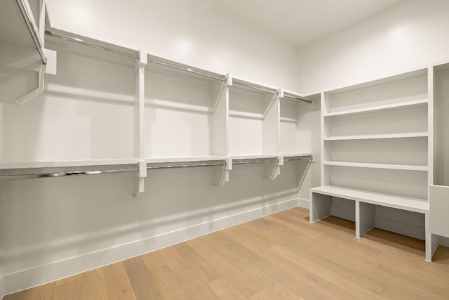 5615 Shoalwood Ave, Austin, TX 78756 - spacious closet featuring wood finished floors