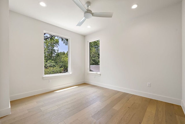 5615 Shoalwood Ave, Austin, TX 78756 - empty room featuring baseboards, light wood finished floors, recessed lighting, and a ceiling fan