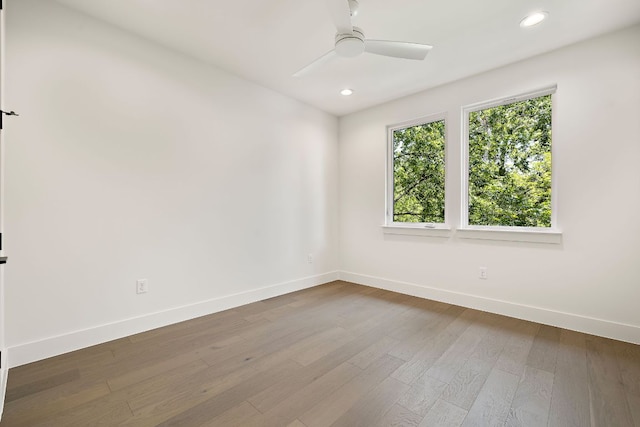 5615 Shoalwood Ave, Austin, TX 78756 - empty room with baseboards, dark wood-style flooring, recessed lighting, and ceiling fan