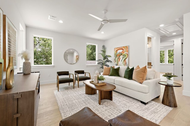 5615 Shoalwood Ave, Austin, TX 78756 - living area with healthy amount of natural light, attic access, recessed lighting, a ceiling fan, and light wood finished floors